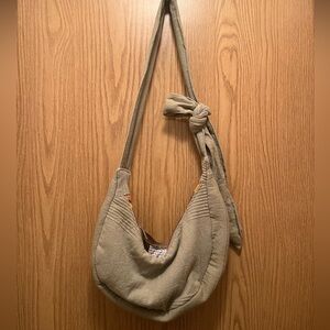 Handmade crescent purse with adjustable bow strap